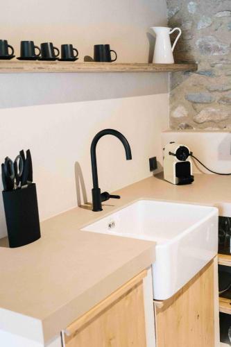 Η κουζίνα ή μικρή κουζίνα στο Cal Rus Apartament 3