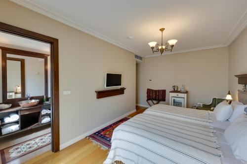Postel nebo postele na pokoji v ubytování Akanthus Hotel Ephesus
