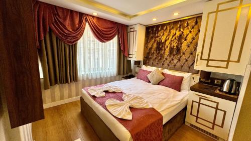 a bedroom with a bed in a room at Burj Al Istanbul in Istanbul
