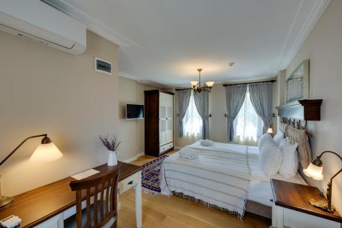 Postel nebo postele na pokoji v ubytování Akanthus Hotel Ephesus