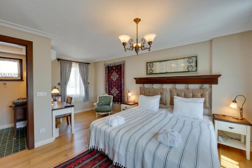 Postel nebo postele na pokoji v ubytování Akanthus Hotel Ephesus
