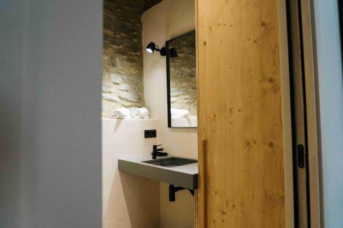 Ένα μπάνιο στο Cal Rus Apartament 3