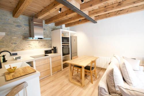 Η κουζίνα ή μικρή κουζίνα στο Cal Rus Apartament 3