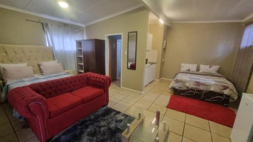 Ένα ή περισσότερα κρεβάτια σε δωμάτιο στο A&H Guesthouse