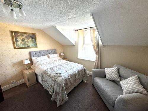 Postel nebo postele na pokoji v ubytování Ashfield Guesthouse