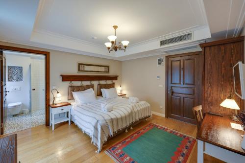 Postel nebo postele na pokoji v ubytování Akanthus Hotel Ephesus