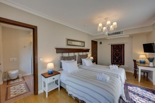 Postel nebo postele na pokoji v ubytování Akanthus Hotel Ephesus