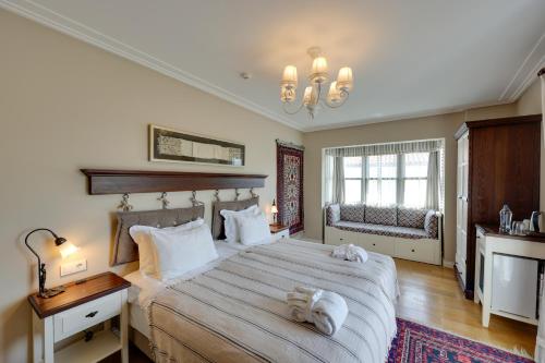 Postel nebo postele na pokoji v ubytování Akanthus Hotel Ephesus