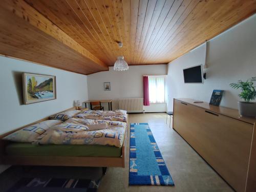 Postel nebo postele na pokoji v ubytování Hotel du Cerf