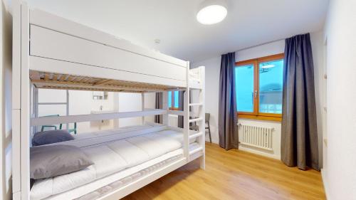 Postel nebo postele na pokoji v ubytování Chalet de l Ours AUTHENTIC Etage Valerie 12 pers
