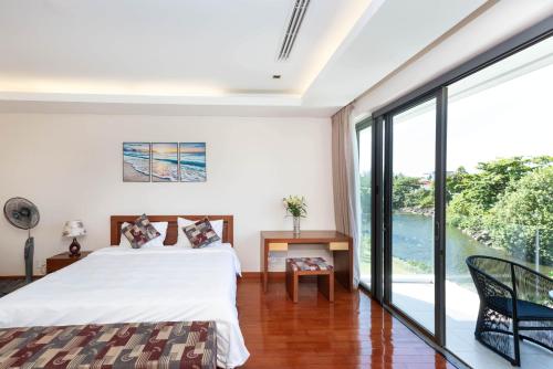 Ένα ή περισσότερα κρεβάτια σε δωμάτιο στο Ocean Sunny Villas Da Nang