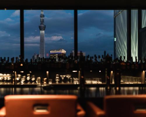 a view of a city skyline with a cell phone at The Gate Hotel Asakusa Kaminarimon by Hulic in Tokyo