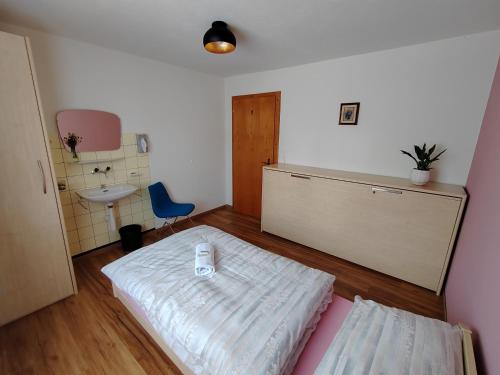 Postel nebo postele na pokoji v ubytování Hotel du Cerf