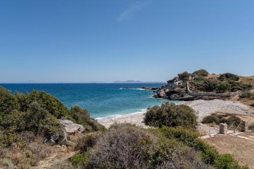 a view of the ocean from a hill at Black Sand in Moutsouna Naxos