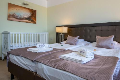 Postel nebo postele na pokoji v ubytování Gunaras Resort Spa Hotel