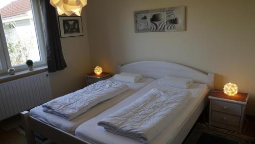 Ένα ή περισσότερα κρεβάτια σε δωμάτιο στο Ferienhaus Mantuja