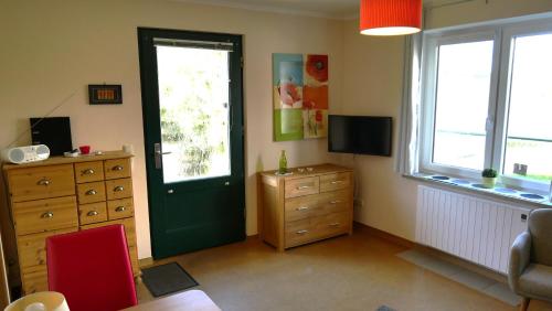 Μια τηλεόραση ή/και κέντρο ψυχαγωγίας στο Ferienhaus Mantuja