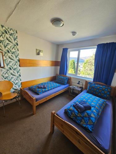 Postel nebo postele na pokoji v ubytování Pitlochry Youth Hostel