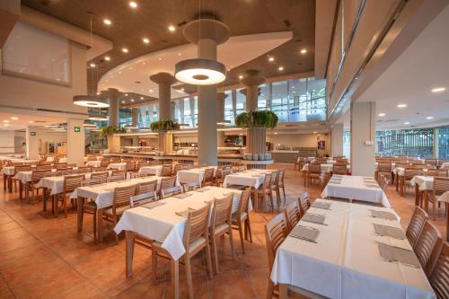 En restaurang eller annat matställe på Hotel-Aparthotel Ponient Dorada Palace by PortAventura World