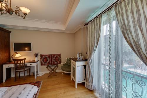 Postel nebo postele na pokoji v ubytování Akanthus Hotel Ephesus