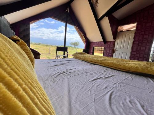 Cama o camas de una habitación en Kilimanjaro view cabin-Amboseli