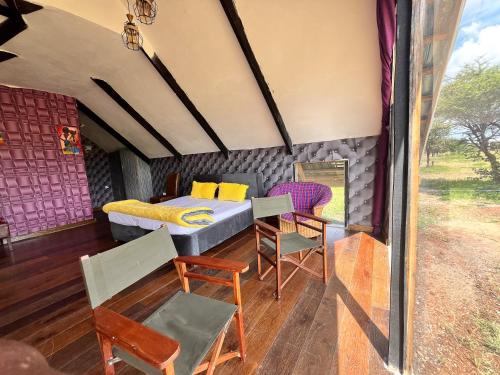Zona de estar de Kilimanjaro view cabin-Amboseli