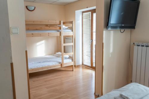 Postel nebo postele na pokoji v ubytování Zvezditsa Chalet