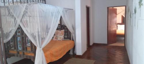 Ένα ή περισσότερα κρεβάτια σε δωμάτιο στο Villa Palma