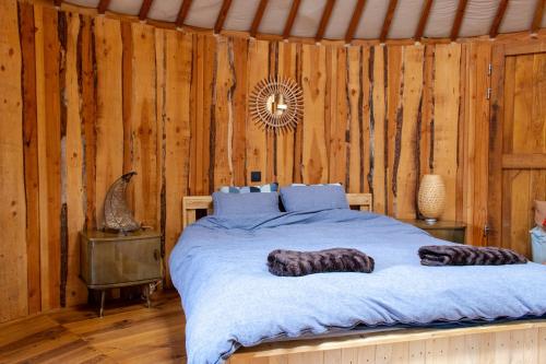 Postel nebo postele na pokoji v ubytování les Refuges du Chalet