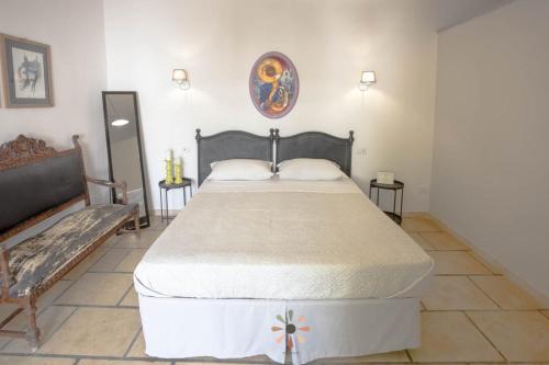 Postel nebo postele na pokoji v ubytování Agriturismo tenuta Margherita