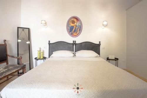 Postel nebo postele na pokoji v ubytování Agriturismo tenuta Margherita