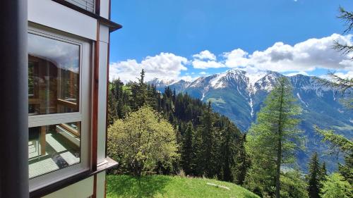 a view from a window of a mountain at Haus Bella Vista in Riederalp