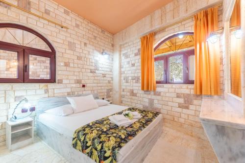 Ένα ή περισσότερα κρεβάτια σε δωμάτιο στο Paco's Resort Family Villa 14