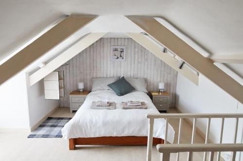 Voodi või voodid majutusasutuse Light and spacious house full of Cornish charm toas