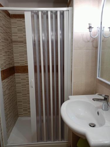 a bathroom with a shower and a sink at B&B Leonida in Tropea