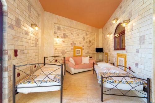 Ένα ή περισσότερα κρεβάτια σε δωμάτιο στο Paco's Resort Family Villa 11