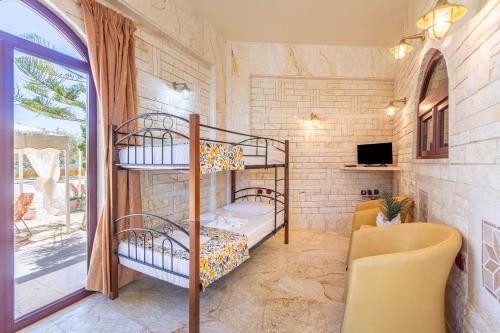 Postel nebo postele na pokoji v ubytování Paco's Resort Family Villa 10