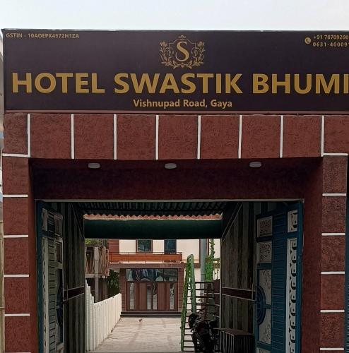 an entrance to a hotel waitzitz blump sign on a building at Hotel Swastik Bhumi in Gaya