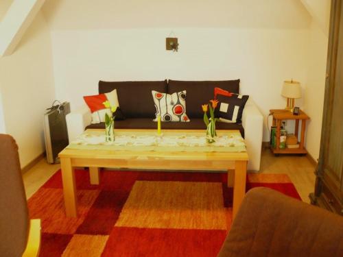 Khu vực ghế ngồi tại Ferienwohnung Sauer