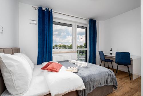 Postel nebo postele na pokoji v ubytování Warsaw Modern Stay