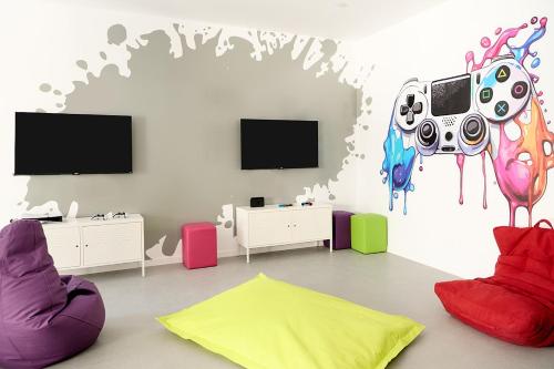 TV o dispositivi per l'intrattenimento presso FERGUS Club Mallorca Waterpark