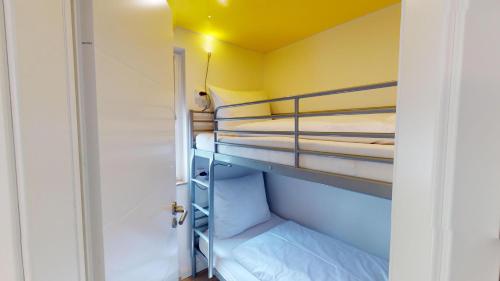 En eller flere senge i et værelse på Residenz am Yachthafen "Wohnung 18"