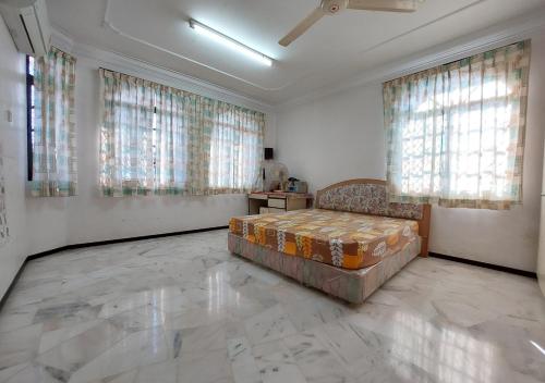 Posezení v ubytování Kluang Budget Backpacker Home