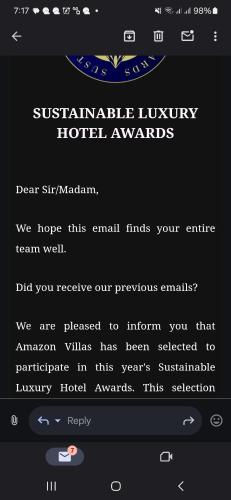een sms-bericht van de Superstar Luxury Hotel Awards bij Amazon Villas in Soufrière