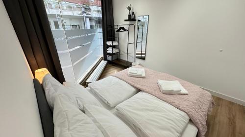 Katil atau katil-katil dalam bilik di Das Loft - Sauna - 4 Schlafzimmer - 2 Bäder - Stadtmitte - 2 Parkplätze