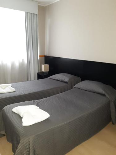 Cama o camas de una habitación en Hotel Aniene