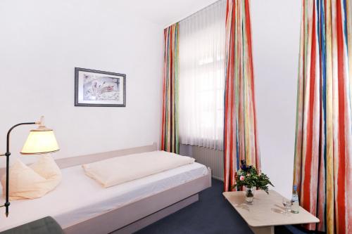 Postel nebo postele na pokoji v ubytování Landhaus Danielshof