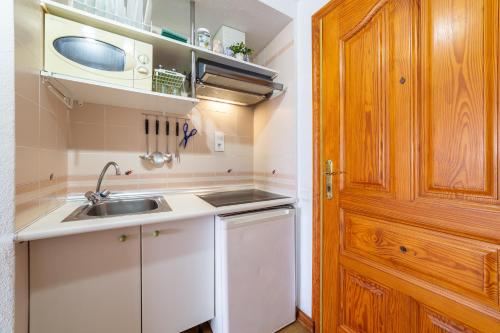 Η κουζίνα ή μικρή κουζίνα στο Apartamento residencial Fénix