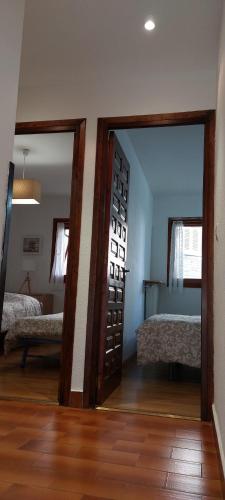 Postel nebo postele na pokoji v ubytování Casa Isabel