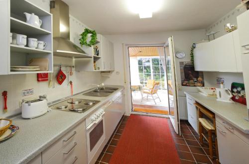 Kuchyň nebo kuchyňský kout v ubytování Ferienhaus Glücksfall
